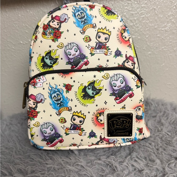 Loungefly Other - Loungefly Cream Disney Villains Mini Backpack with Multicolor Chibi Print